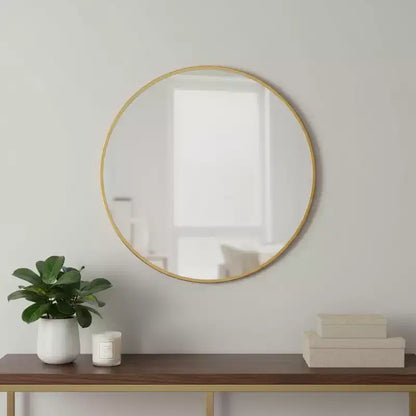 Miroir décoratif rond à cadre métallique doré de 31 po