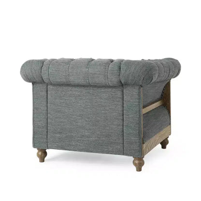 Fauteuil club Chesterfield en tissu capitonné avec clous décoratifs