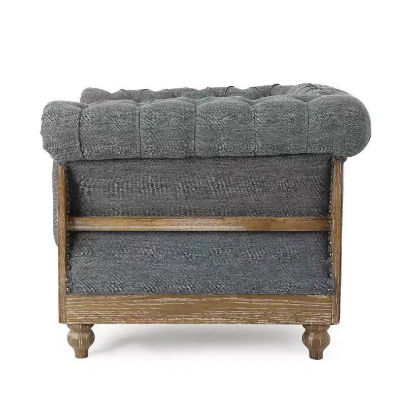 Fauteuil club Chesterfield en tissu capitonné avec clous décoratifs