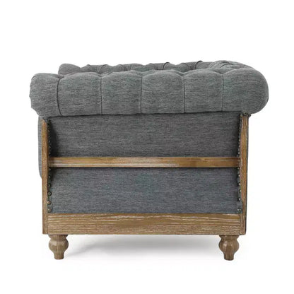 Fauteuil club Chesterfield en tissu capitonné avec clous décoratifs