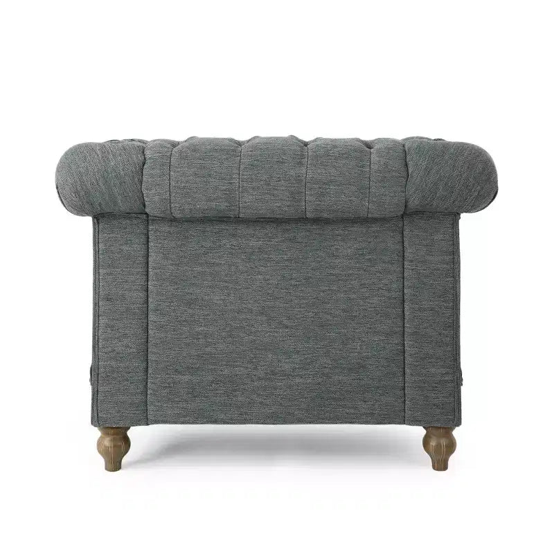 Fauteuil club Chesterfield en tissu capitonné avec clous décoratifs