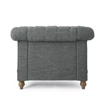 Fauteuil club Chesterfield en tissu capitonné avec clous décoratifs