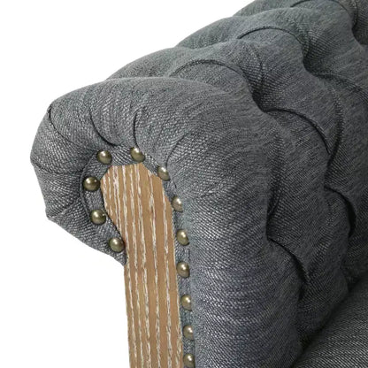 Fauteuil club Chesterfield en tissu capitonné avec clous décoratifs