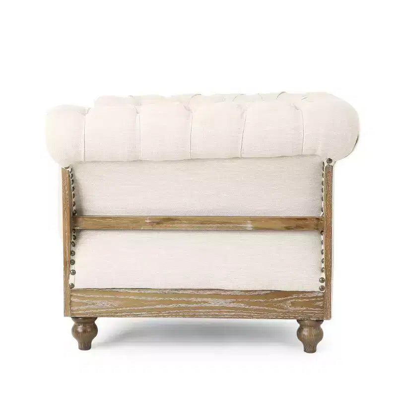 Fauteuil club Chesterfield en tissu capitonné avec clous décoratifs