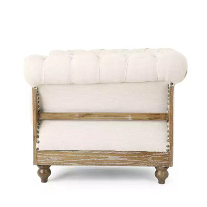 Fauteuil club Chesterfield en tissu capitonné avec clous décoratifs