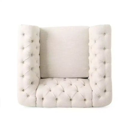 Fauteuil club Chesterfield en tissu capitonné avec clous décoratifs