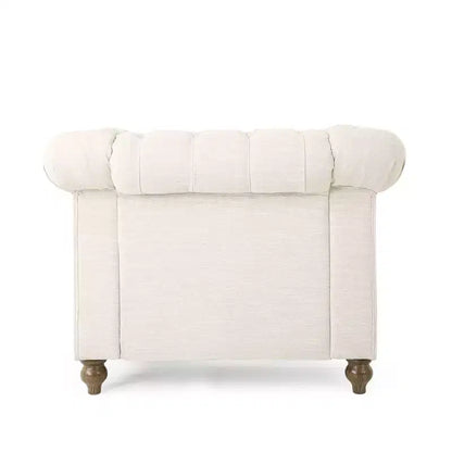 Fauteuil club Chesterfield en tissu capitonné avec clous décoratifs