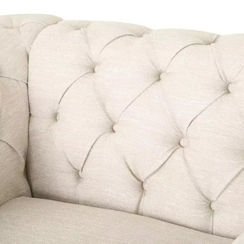 Fauteuil club Chesterfield en tissu capitonné avec clous décoratifs