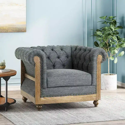 Fauteuil club Chesterfield en tissu capitonné avec clous décoratifs