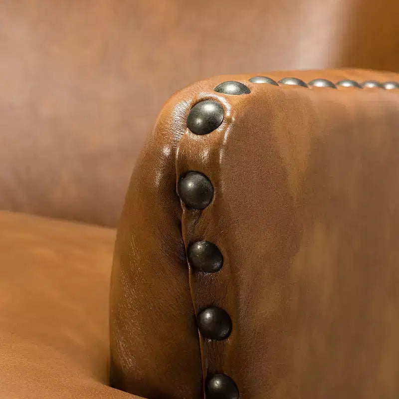 Fauteuil à oreilles en cuir végétalien de transition avec garniture cloutée pour salon et chambre à coucher