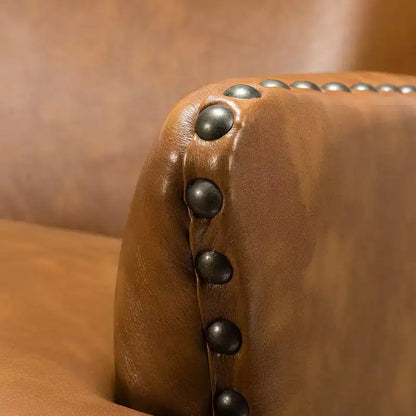 Fauteuil à oreilles en cuir végétalien de transition avec garniture cloutée pour salon et chambre à coucher